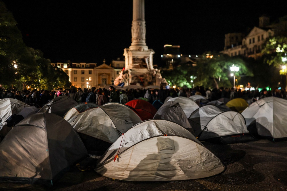 Dozens of tents are pictured during a encampment set up in protest against housing shortage, soaring rents and low wages, at Rossio square in central Lisbon. (AFP/Getty)