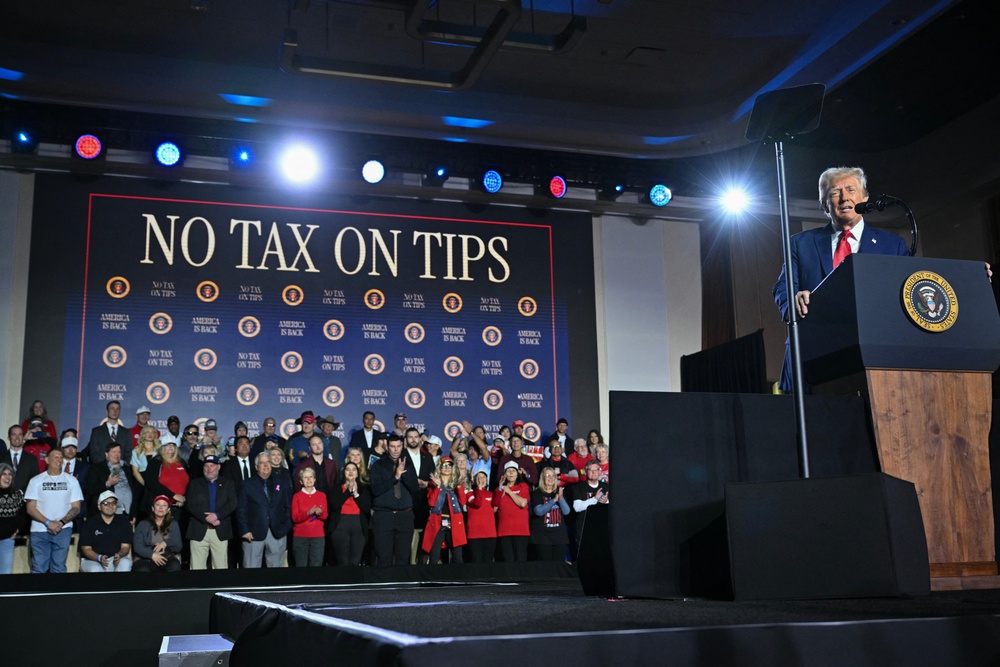 MAGA Inc, a super PAC connected to the president, is now airing an ad developed by the White House to blast Democrats who voted against his so-called ‘no tax on tips’ proposal (AFP/Getty)