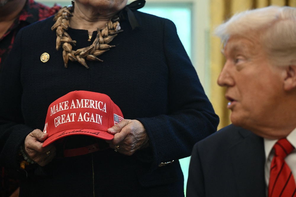The cost of President Donald Trump’s official merchandise range has climbed with inflation, with his signature red MAGA cap now 120 percent more expensive than it was a decade ago (AFP/Getty)