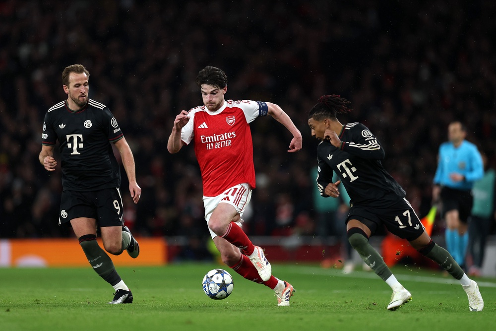 Declan Rice of Arsenal is challenged by Harry Kane and Michael Olise in last season's Champions League (Getty)