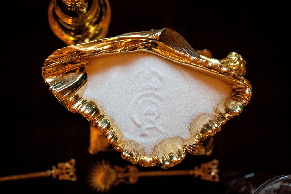 The King Charles III cypher imprinted into salt on the banquet table in St George’s Hall (Aaron Chown/PA) (PA Wire)