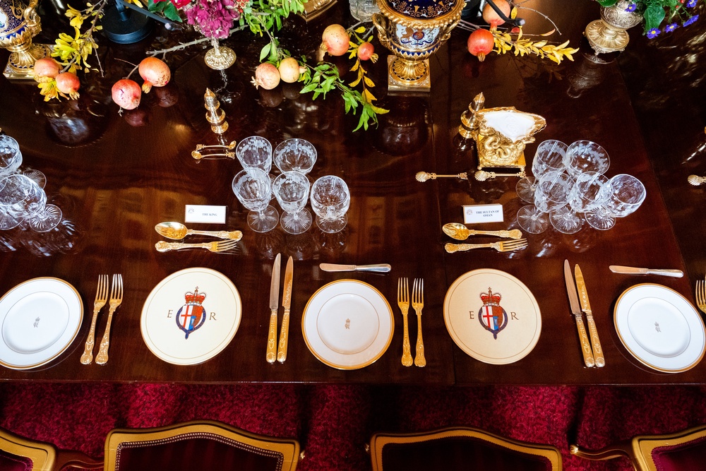 Pomegranate from the Windsor Castle gardens form part of the floral decorations at the place settings for the banquet (Aaron Chown/PA) (PA Wire)