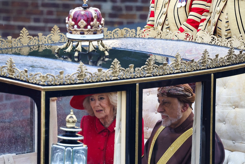The Queen on her way to Windsor Castle in the Scottish State Coach accompanied by Omani deputy prime minister for defence affairs Sayyid Shihab bin Tariq Al Said (PA) (PA Wire)
