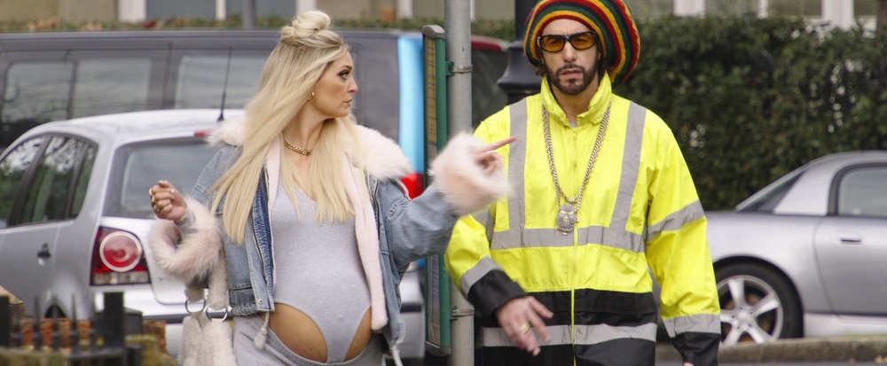 Morgana Robinson and Sacha Baron Cohen in 'Ali G: Who Iz I?' (PA)