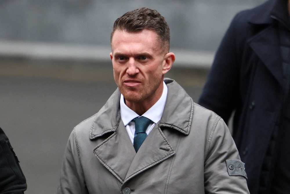 Criticising the newspaper’s story, Tommy Robinson told the jury: ‘I would not endanger any innocent family’ (Reuters)