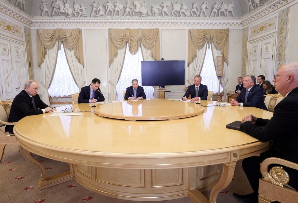 Vladimir Putin, US special envoy Steve Witkoff and other officials attend a meeting at the Constantine Palace on Wednesday (Reuters)
