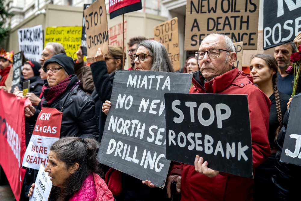 Protesters fathered outside the Department for Energy Security and Net Zero following the decision (Fossil Free London/PA) (PA Media)