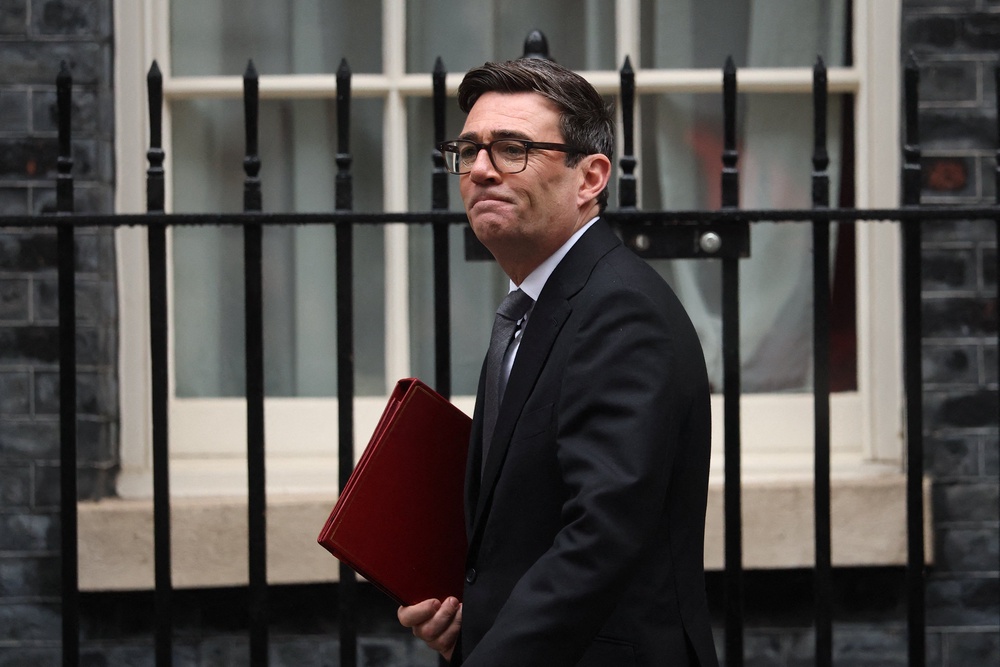 Andy Burnham said the postal service had been 'unacceptable for far too long' as it has struggled to meet its targets to deliver letters (Reuters)