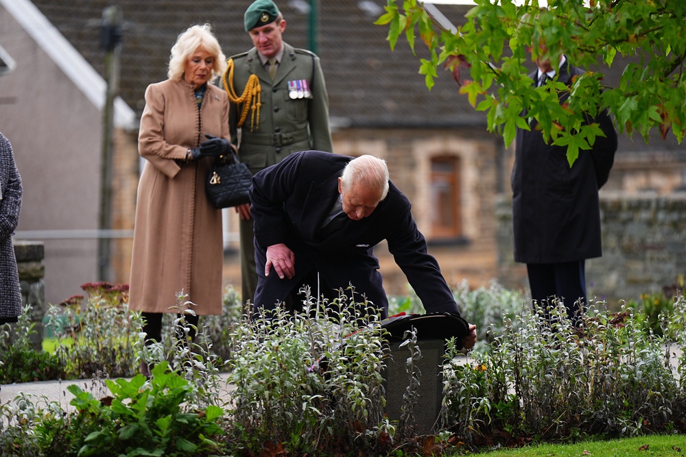 The King laying a wreath at Aberfan Memorial Garden (Aaron Chown/PA) (PA Wire)