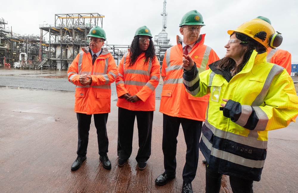 Scottish secretary Douglas Alexander, energy secretary Miatta Fahnbulleh and chancellor of the exchequer, John Healey during a visit to Shell UK's St Fergus Gas Terminal in Peterhead, Aberdeenshire, (PA)