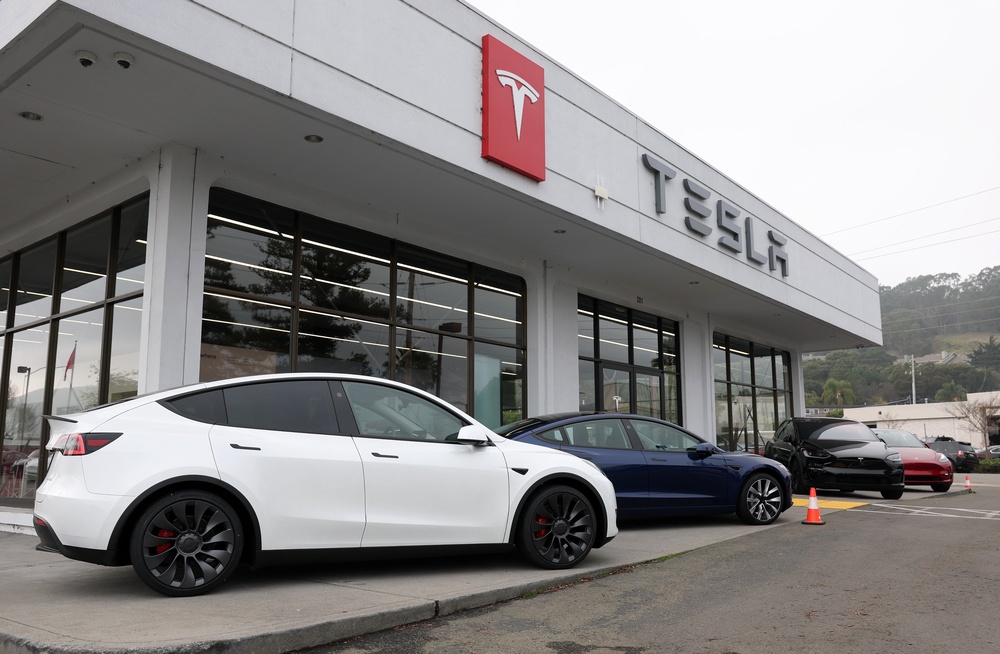 Model 3 and Model Y made up nearly all deliveries. Other models including the Cybertruck accounted for just 8,295 (Getty)