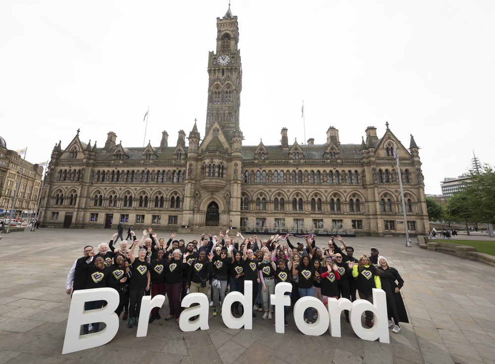 Volunteers at City Park in Bradford join together to celebrate the launch of Bradford 2025 UK City of Culture (Owen Humphreys/PA) (PA Archive)