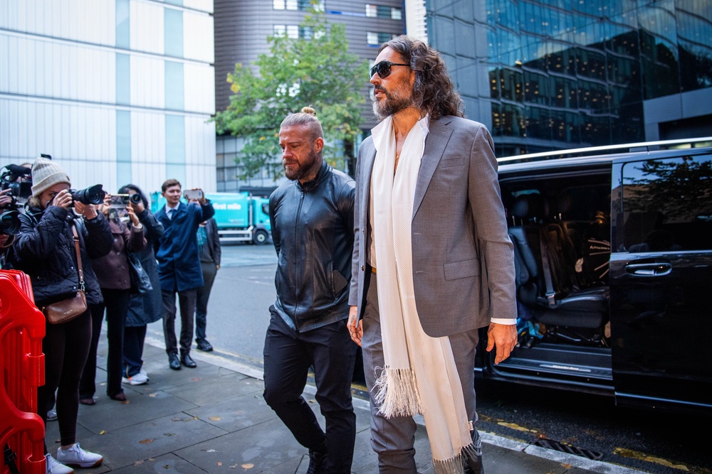 Russell Brand arriving at Southwark Crown Court on Thursday (PA)