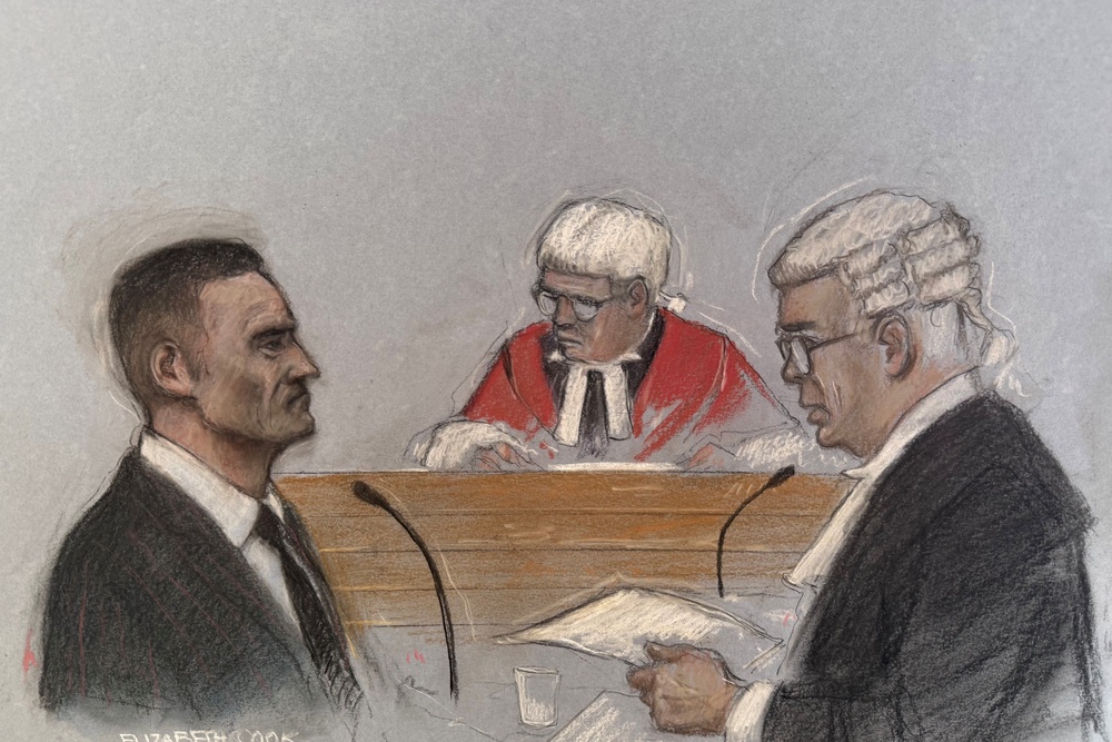 Tommy Robinson said he hired private investigators to find the home addresses of freelance journalist Andrew Young and editor Jacob Dirnhuber and take photographs (PA)