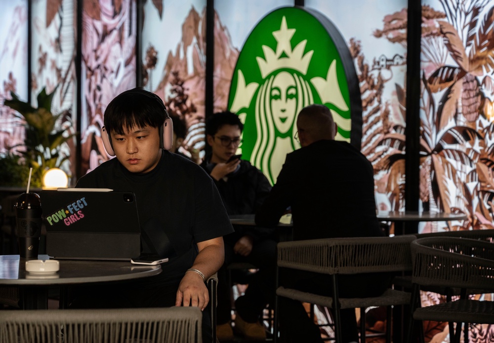 Starbucks has spent years selling more than coffee in China, building its cafés around the idea of a “third place” between home and work, where customers can meet friends, work, or linger over a drink (Getty)
