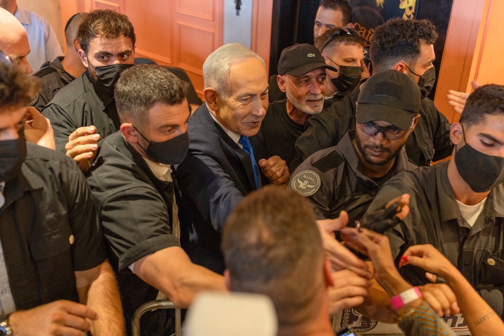 Netanyahu with supporters during a Likud Party meet-and-greet (AFP/Getty)