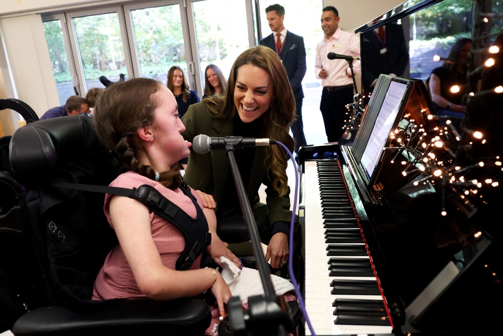 Kate with Charlotte Freegard during a music therapy session (Chris Radburn/PA) (PA Wire)