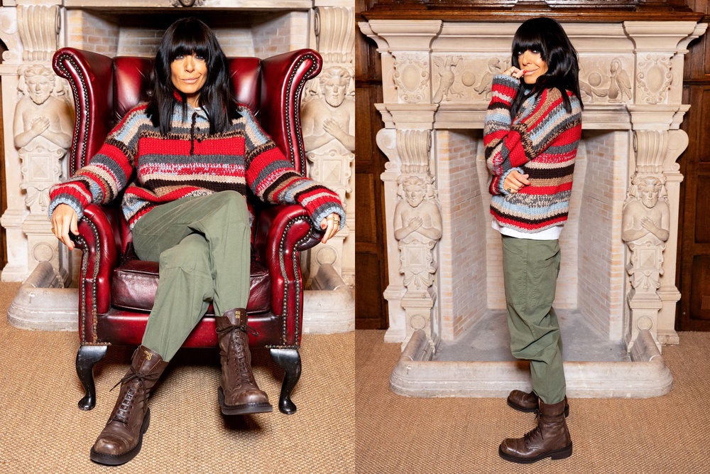 Injecting a bit of colour into her wardrobe, Claudia paired khaki pants with a red striped jumper and combat boots (BBC/Studio Lambert)