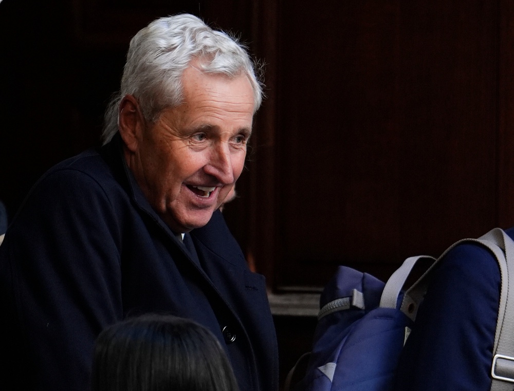 Mark Austin leaves St Bride’s Church (Jordan Pettitt/PA)