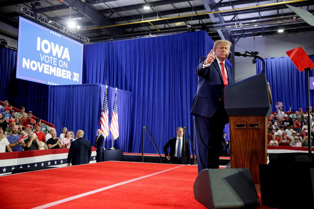 US president Donald Trump points as he speaks during a Republican campaign rally in Sioux City, Iowa, US, 22 October 2026 (Reuters)