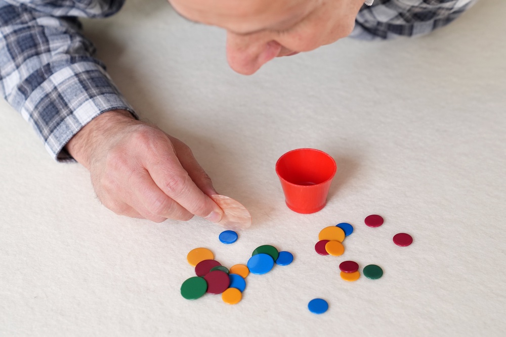Prof Patrick Barrie, 61, triumphed in the World Singles Tiddlywinks Championships on Thursday after a seven-hour match at the Castle Inn pub in Cambridge