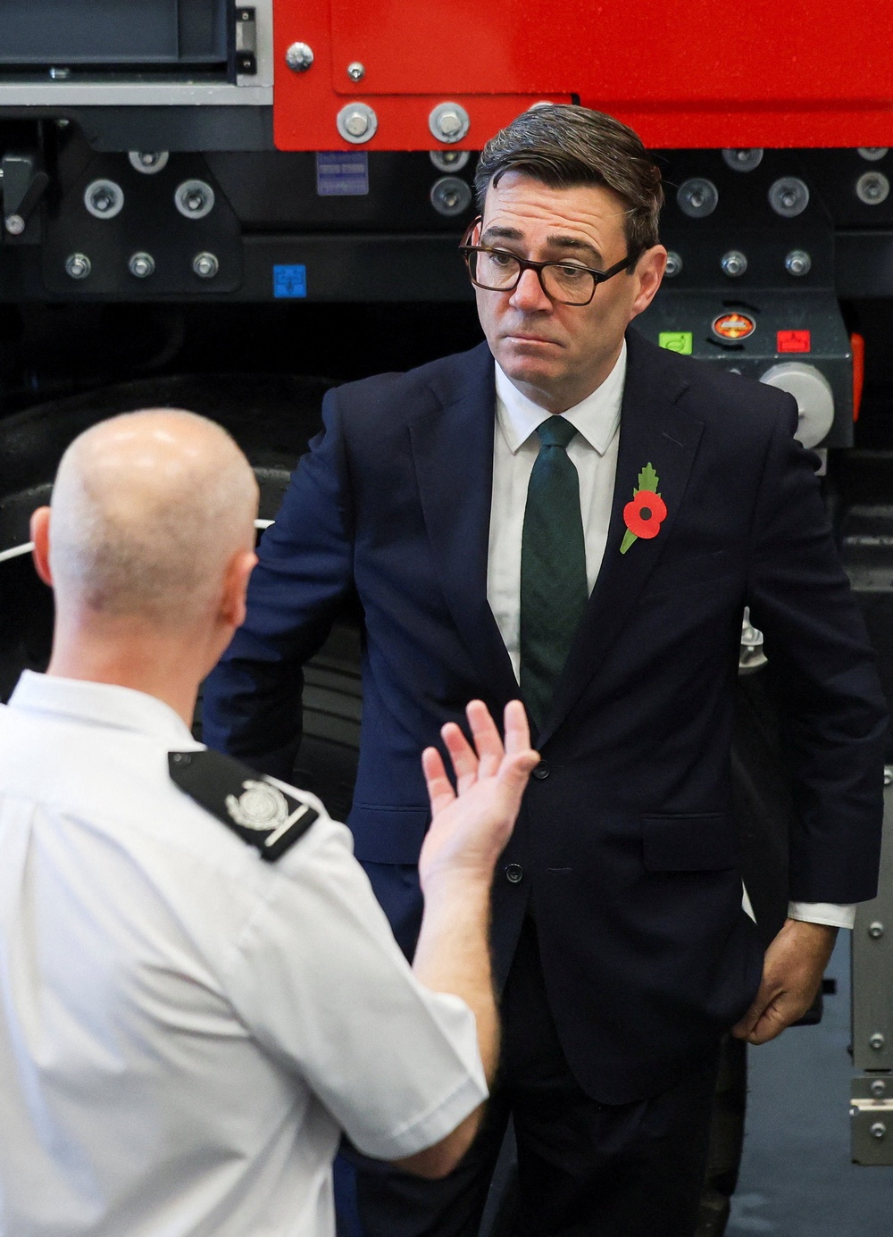 Prime Minister Andy Burnham meets a member of the fire services during England’s first wildfire resilience summit (Temilade Adelaja/PA) (PA Wire)