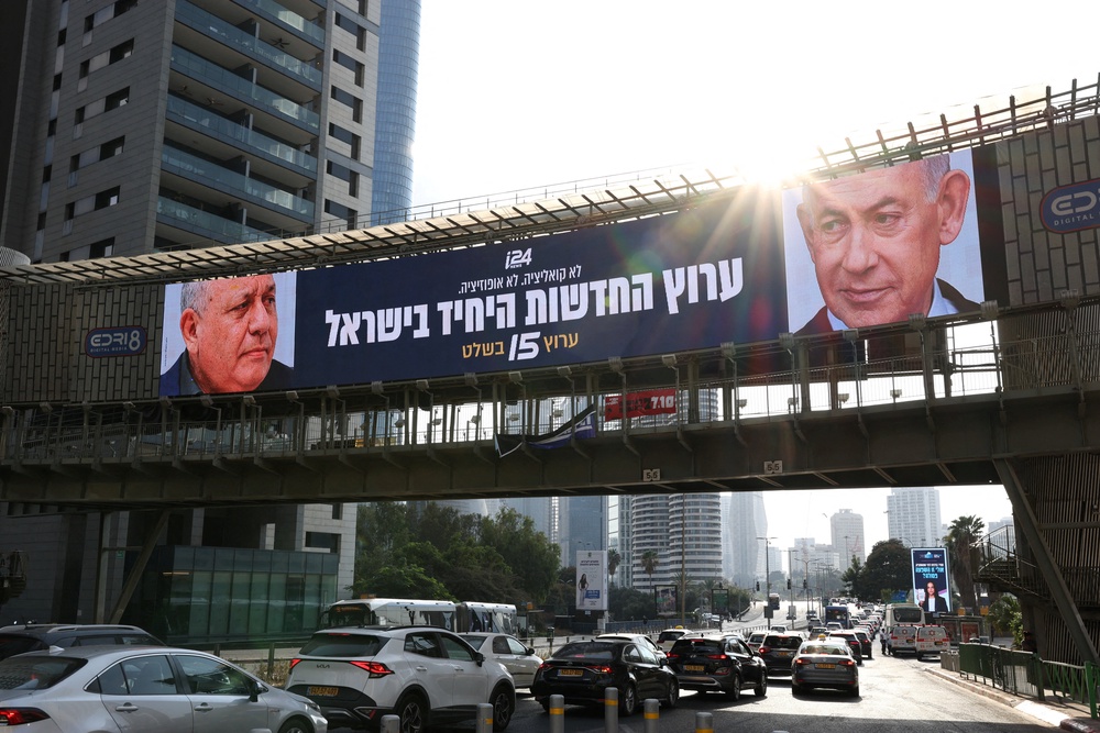 An ad for an Israeli TV channel that will broadcast the election coverage, featuring Israeli prime minister Benjamin Netanyahu and his chief rival, Gadi Eisenkot (Reuters)