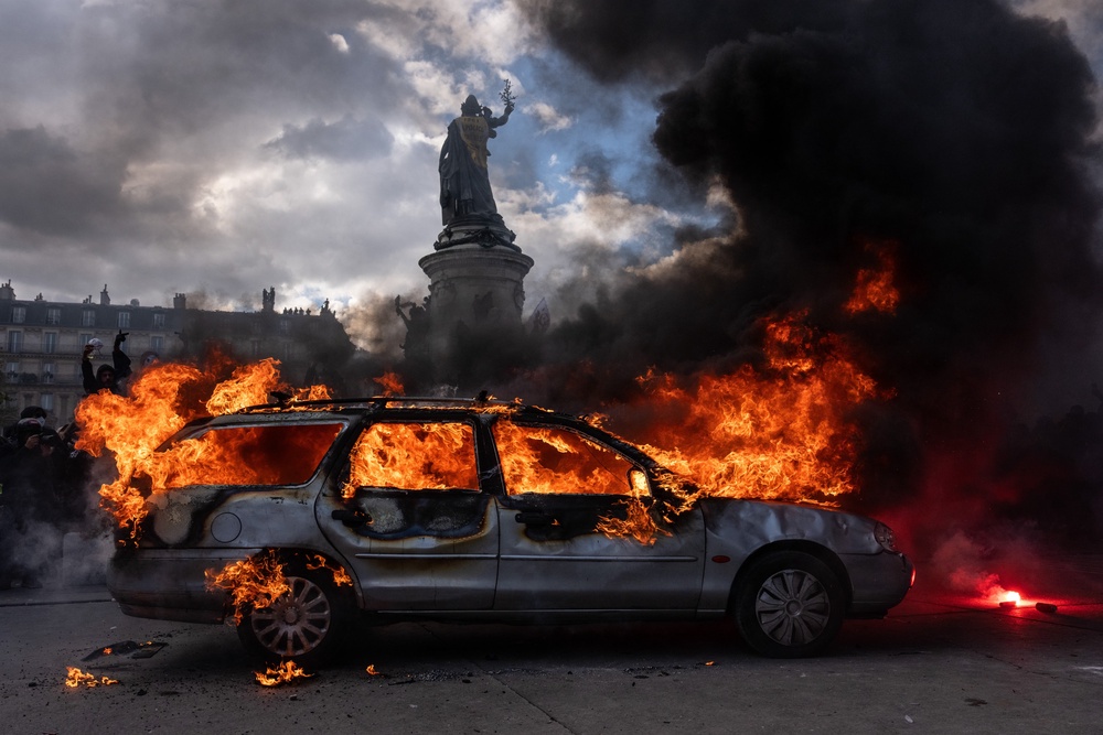 A car ablaze during demonstrations on October 17, 2026 in Paris, France (Getty)