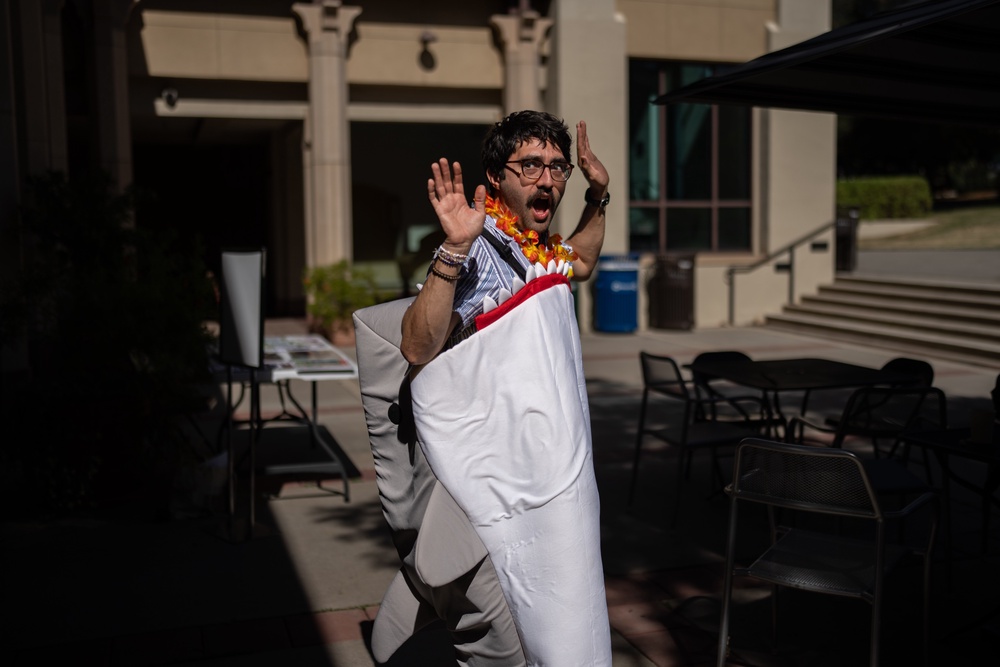 Braddock Sandoval, a chemistry professor at Occidental College, with a costume he picked out during a Halloween costume swap (AP)