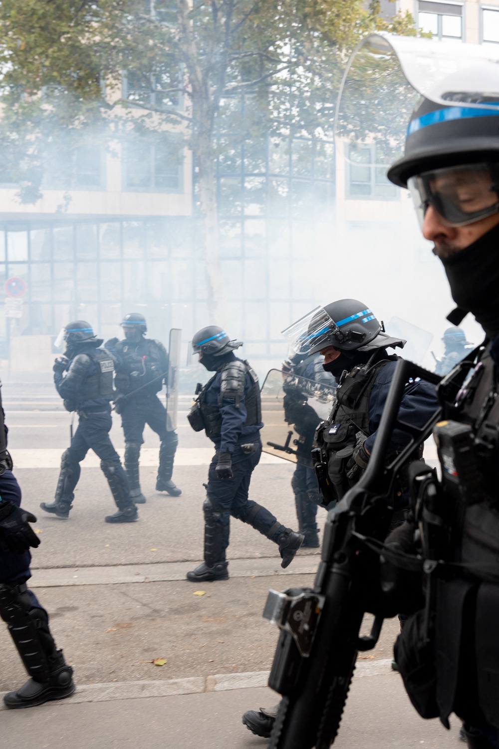 A crowd retreats after CRS officers a unit of the National Police fired tear gas during a demonstration (AFP/Getty)