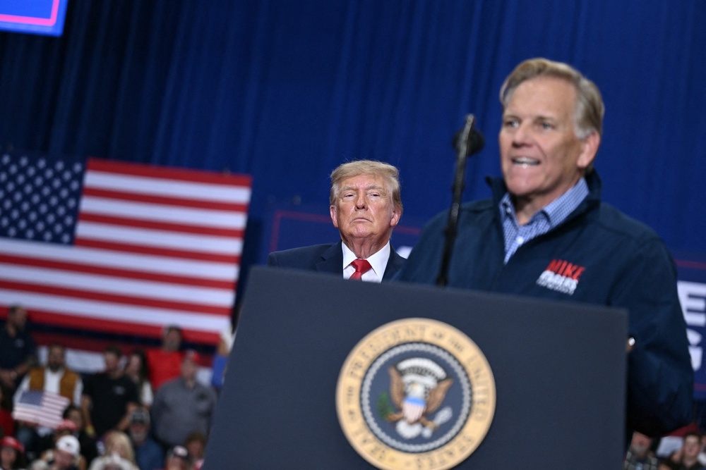 Trump stopped in Port Huron, Michigan, to campaign for Senate candidate Mike Rogers and other Republicans in November’s midterm elections during his month-long rally blitz (AFP via Getty Images)
