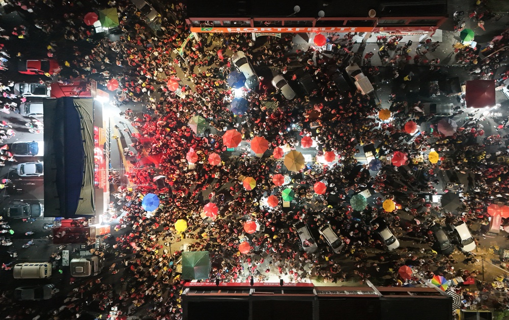 Aerial view of supporters of Brazil's President and presidential candidate Luiz Inacio Lula da Silva celebrating after learning the results of the presidential runoff election in Brasilia, Brazil (AFP/Getty)