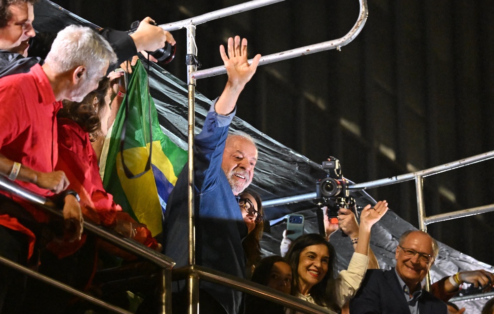 Brazil's president and presidential candidate Luiz Inacio Lula da Silva gestures to supporters after winning the presidential runoff election in Sao Paulo, Brazil, on 26 October 2026 (AFP/Getty)
