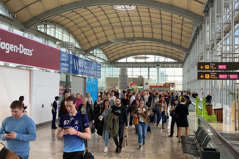 Passengers are evacuated at Alicante-Elche airport on January 15, 2020 in Alicante after a fire erupted in the terminal (AFP/Getty)