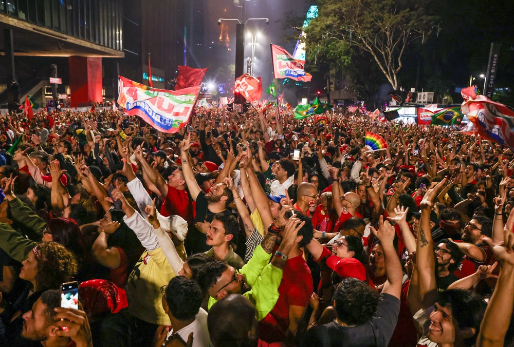 Supporters of Presidential candidate and incumbent president Luiz Inacio Lula da Silva of Brazil celebrate after the results on general election day (Getty)