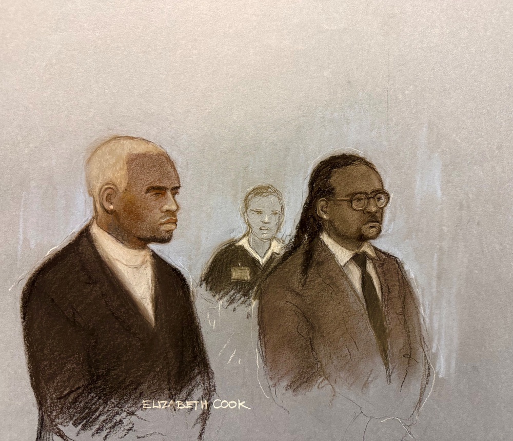 A court artist sketch of Chris Brown appearing in the dock alongside Omololu Akinlolu (right) at Southwark Crown Court (PA)