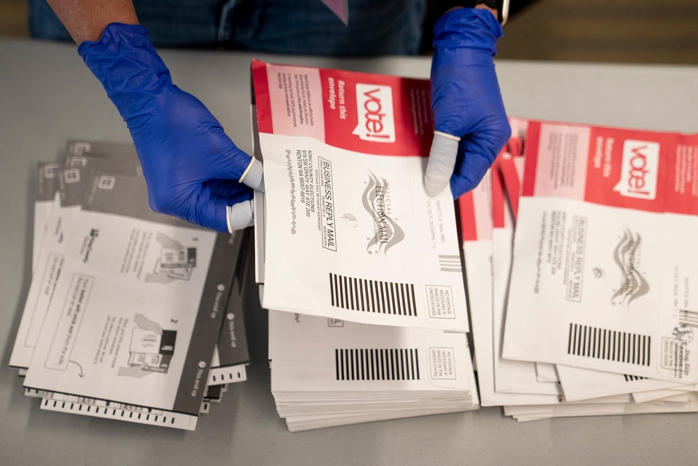 An election worker opens voter ballots for the midterm elections at the King County Elections headquarters on October 23, 2026 in Renton, Washington (Getty Images)