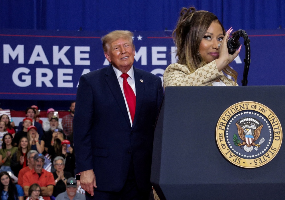President Donald Trump praised Nicki Minaj’s rear during his rally Sunday in Michigan - as she has frequently supported him and his agenda (Reuters)