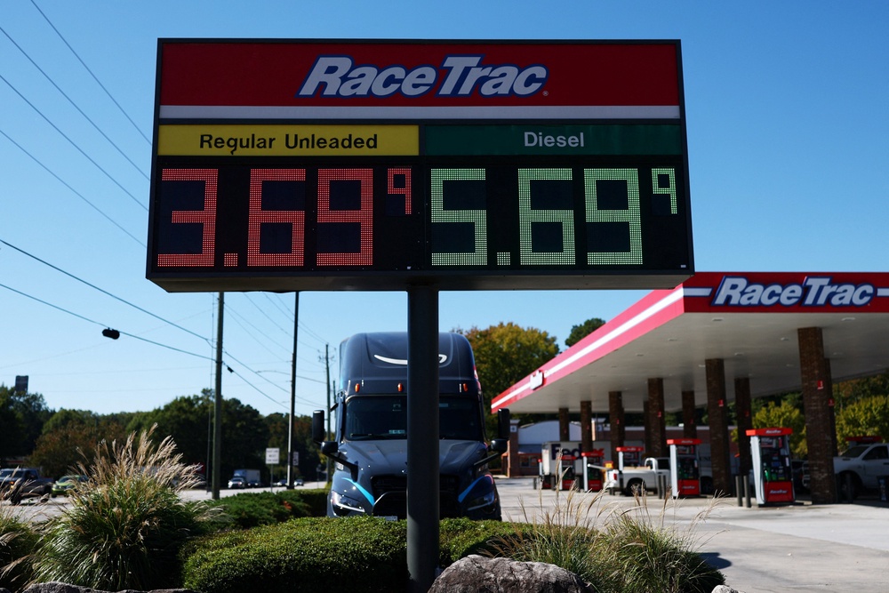 The national average price of gasoline stood at $4.29 a gallon Monday, up from $2.98 two days before the conflict began, according to AAA. Pictured: a gas station in Georgia on October 23 (Reuters)