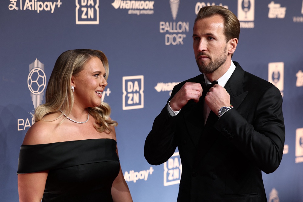 Kane arrives with his wife, Katie Goodland (AFP/Getty)