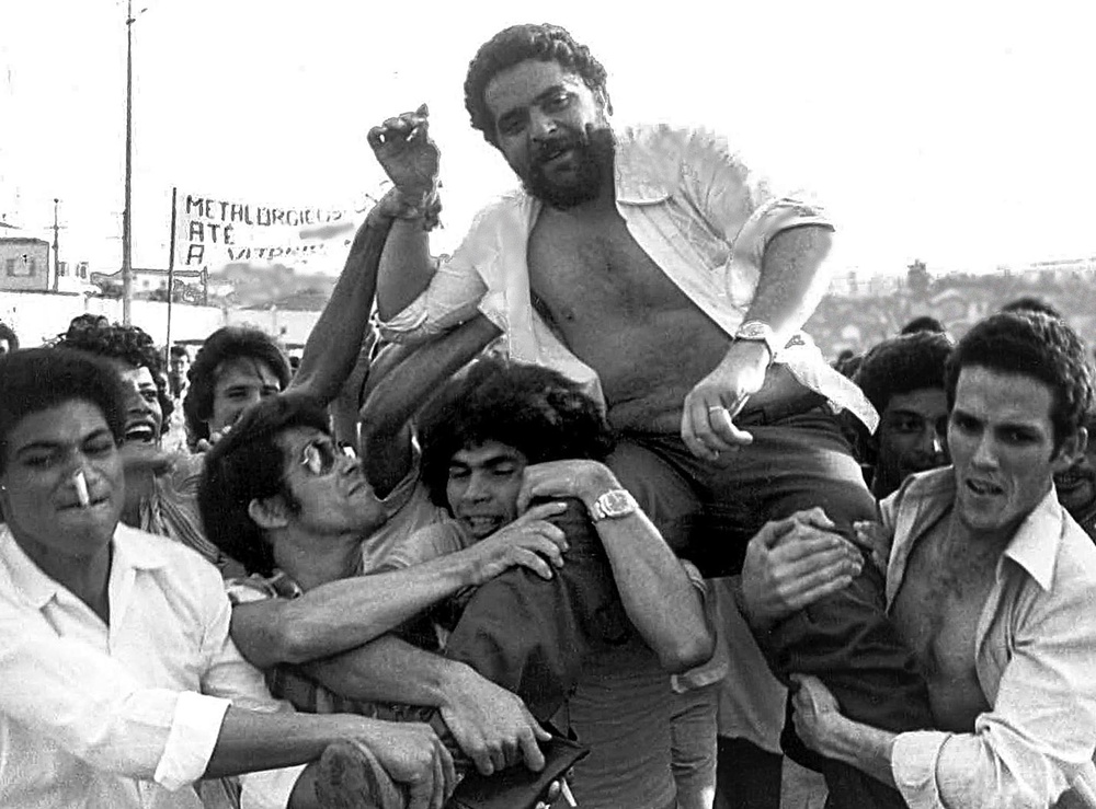 Lula being lifted by metalworker colleagues after a union rally in Sao Bernardo do Campo in 1979 (AFP/Getty)