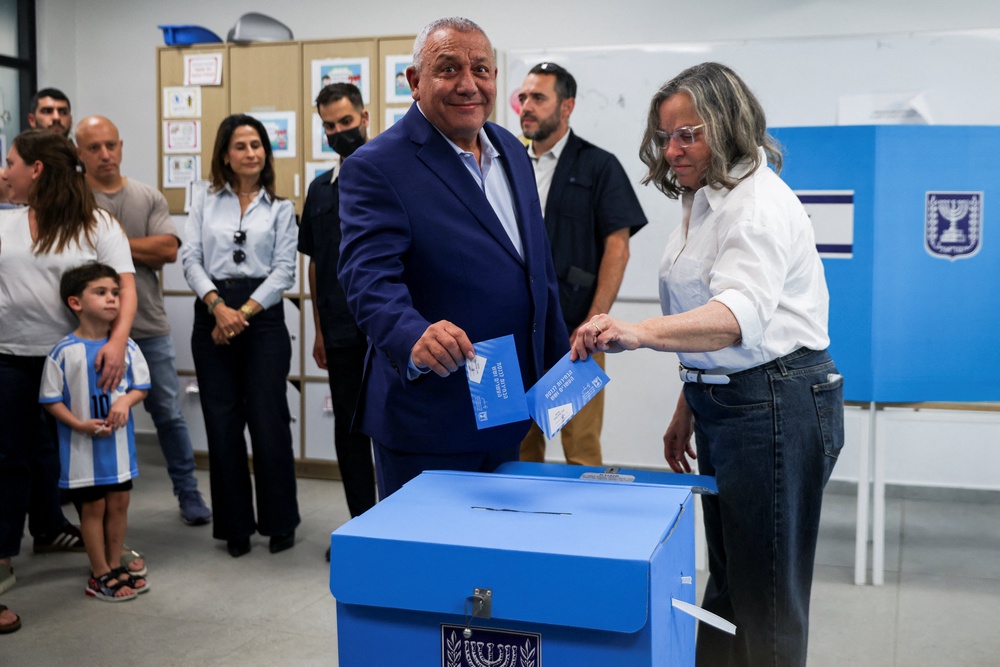 Gadi Eisenkot, leader of the Yashar party, votes during the national election, in Herzliya (Reuters)