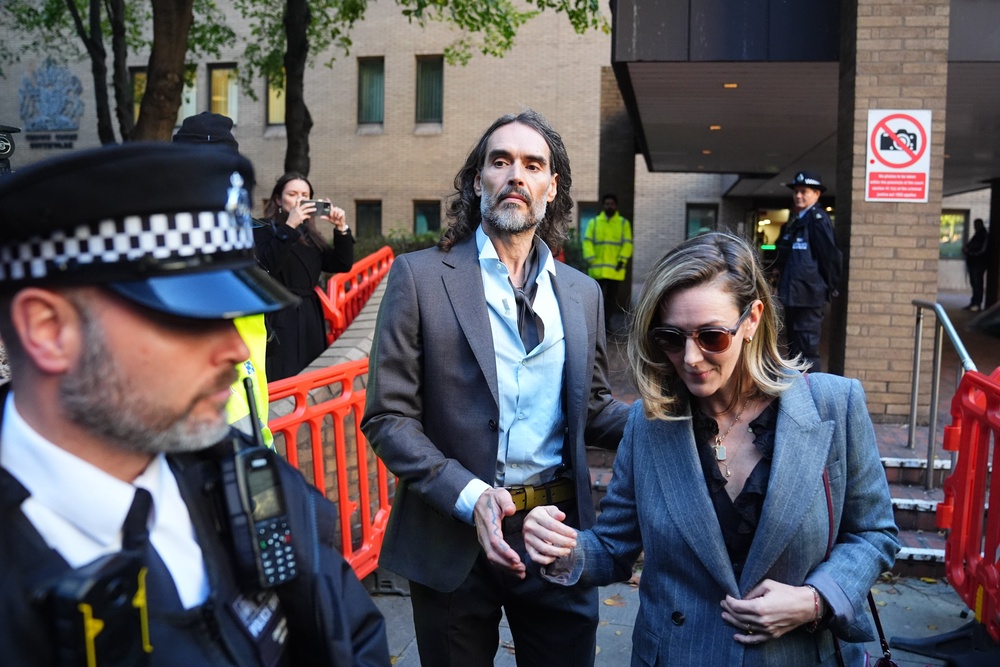 Russell Brand leaving Southwark Crown Court, London, where he faces three charges of rape, indecent assault, and three counts of sexual assault relating to six women. (PA)