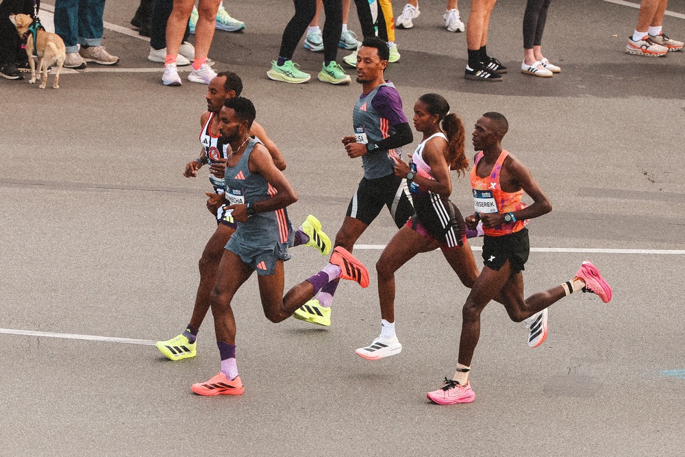 Tigst Assefa ran with male pacemakers in Berlin, with London open to switching its format for 2027 (Getty)