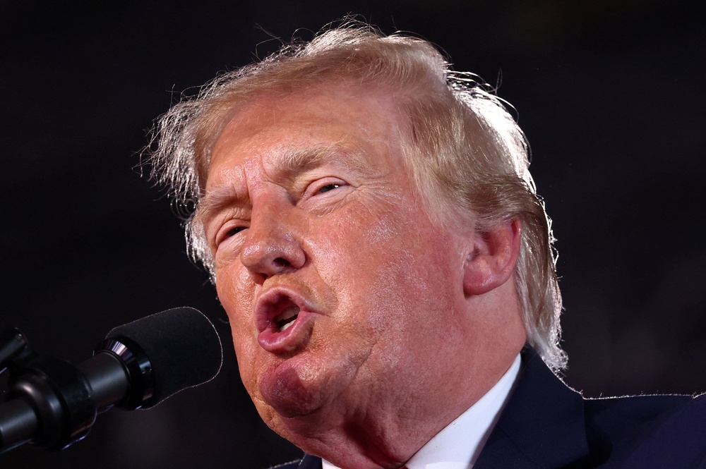 Trump speaks during a midterm election campaign rally to support Republican US Senate candidate Ken Paxton, in Corpus Christi, Texas, US, October 27 (Reuters)