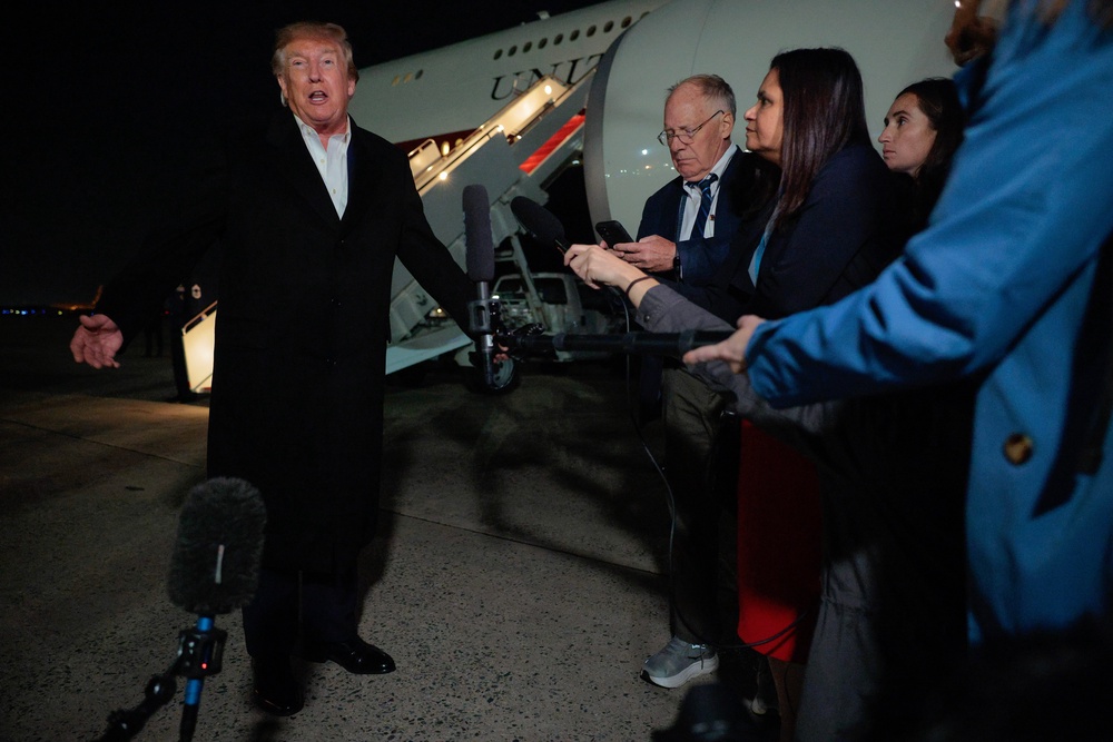 Us president Donald Trump talks to reporters after stepping off Air Force One on October 28, 2026 at Joint Base Andrews, Maryland (Getty)
