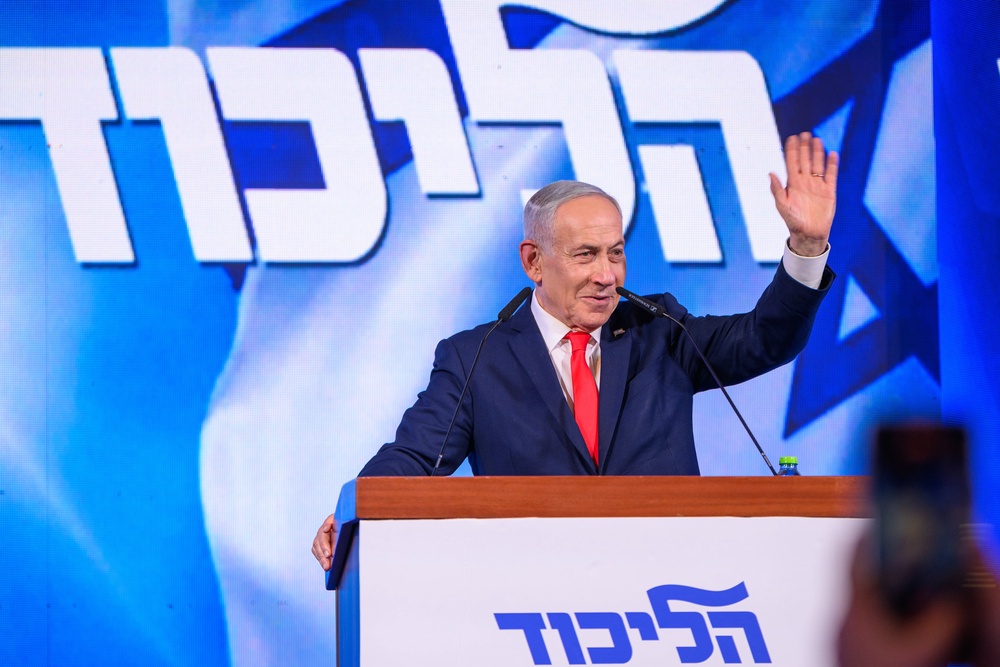 Netanyahu (pictured here waving at supporters on October 28) touted Trump's endorsement during a televised message on Sunday (Getty)
