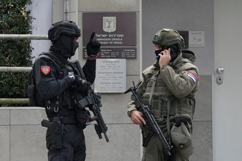 Serbian gendarmes guard the Israeli Embassy after an unidentified assailant attacked a guard with knives (AP)