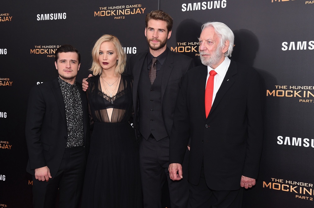 Josh Hutcherson, Jennifer Lawrence, Liam Hemsworth and Donald Sutherland starred in the original Hunger Games franchise (Getty)
