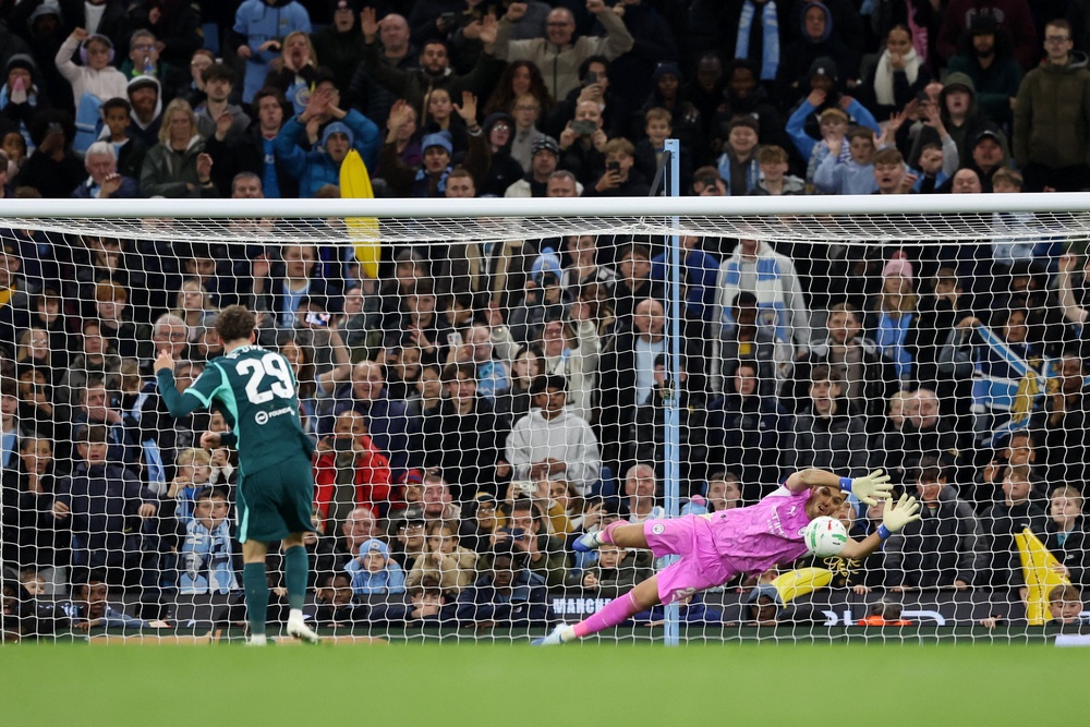 Geronimo Rulli made two saves in the shootout to take Manchester City through (Reuters)